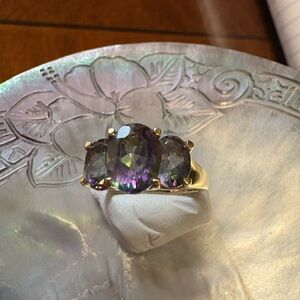 Elegant Gold Ring with Purple Gemstones
